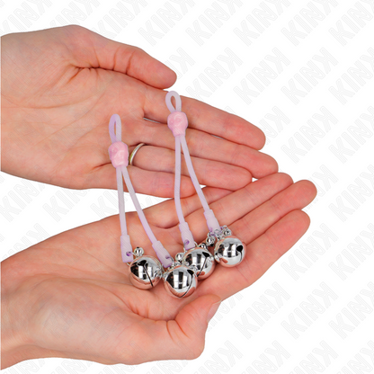 KINK - ŚWIECĄCE ZACISKI NA SUTKI W KSZTAŁCIE CZASZKI Z DZWONKAMI REGULOWANE RÓŻOWE / SREBRNE